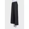 Wool trousers with pleats