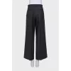 Wool trousers with pleats