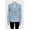 Denim jacket with gold hardware