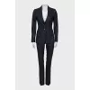 Wool suit consisting of a jacket and striped trousers