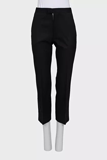Black trousers with arrows and tag