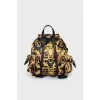 Backpack made of textile with a signature print