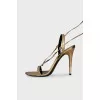 Leather lace-up sandals with tassels