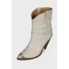 Leather cossacks with metal decor