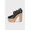 Brown high-heeled shoes