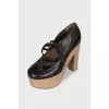 Brown high-heeled shoes