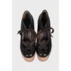 Brown high-heeled shoes