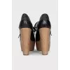 Brown high-heeled shoes