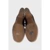 Brown high-heeled shoes