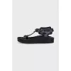 Leather sandals with metal decor