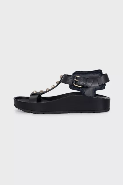 Leather sandals with metal decor