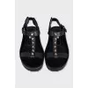 Leather sandals with metal decor