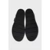 Leather sandals with metal decor