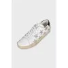 Leather sneakers decorated with stars