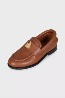Brown loafers with gold decor