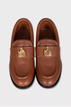 Brown loafers with gold decor