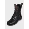 Leather boots with signature print