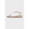 Shiny gold sandals