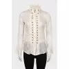 Silk blouse with buttons decorated with frills