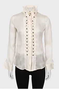 Silk blouse with buttons decorated with frills