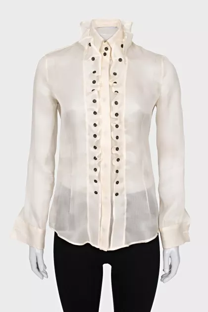 Silk blouse with buttons decorated with frills