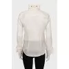 Silk blouse with buttons decorated with frills