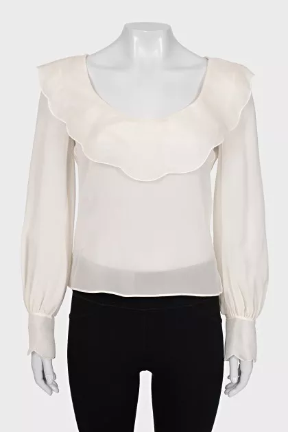 White blouse with a figured collar