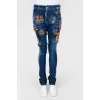Skinny jeans with tag patches