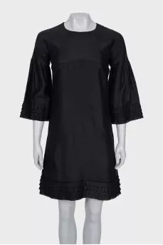 Straight cut dress decorated with frills