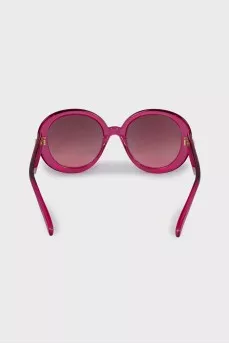Рожеві сонцезахисні окуляри у прозорій оправі