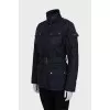 Blue quilted jacket with belt