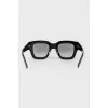 Sunglasses are black