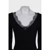 Fitted dress decorated with lace