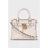 White bag with padlock