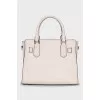 White bag with padlock