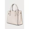 White bag with padlock