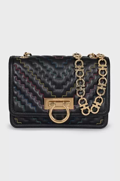 Leather bag on a gold chain