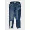 Mid-rise distressed jeans