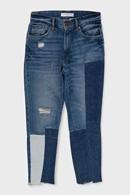 Mid-rise distressed jeans
