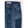 Mid-rise distressed jeans