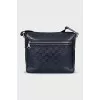 Men's leather bag with branded embossing