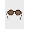 Sunglasses with shaped frames