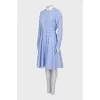 Fitted dress with buttoned waist
