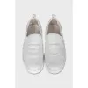 Leather slip-ons with logo