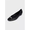Black ballet flats with silver hardware