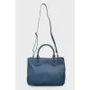 Blue leather bag with two handles