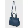 Blue leather bag with two handles