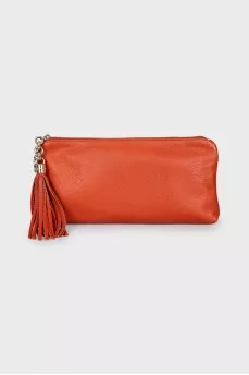 Orange leather clutch