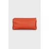 Orange leather clutch