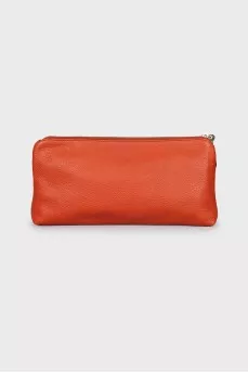 Orange leather clutch